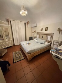 Bedroom with small balcony