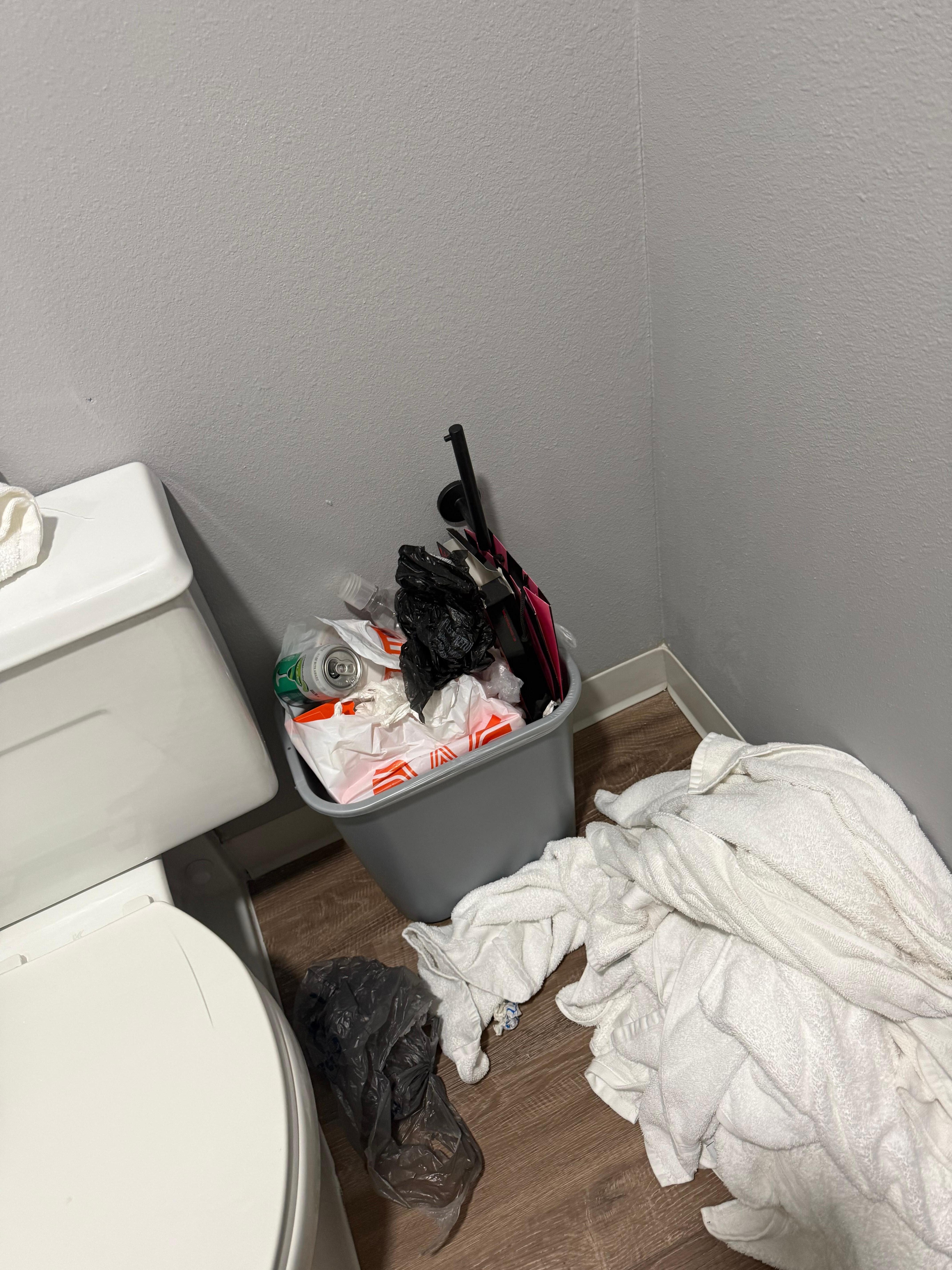 Trash pile up and dirty towels 