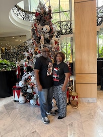 In the reception with their beautiful Christmas tree