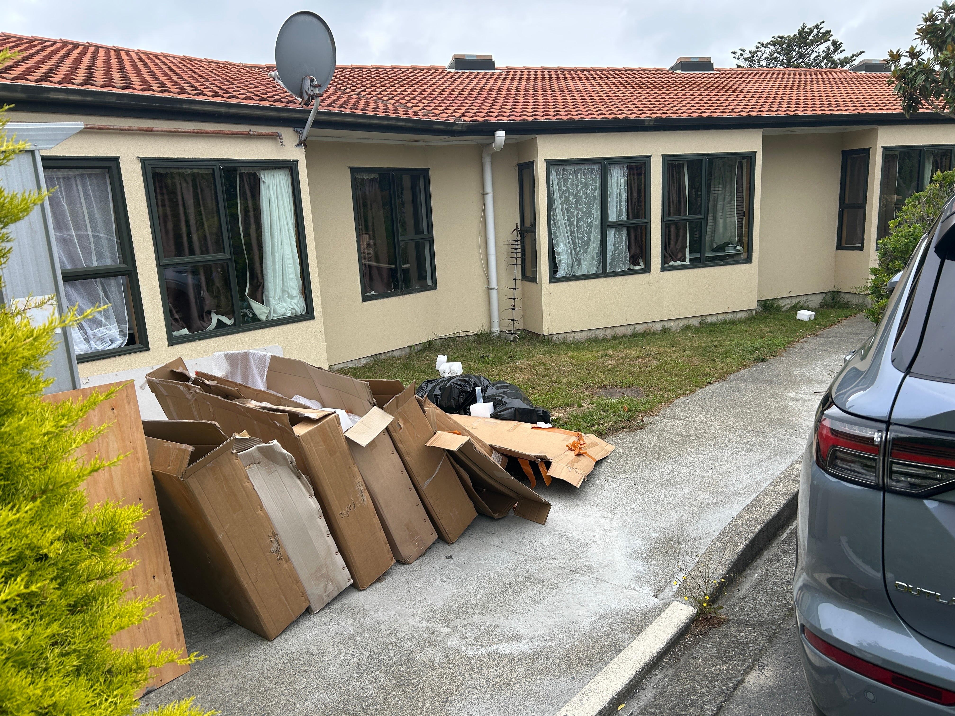 Boxes look like they've been there a while! Look at the dishevalled curtains too