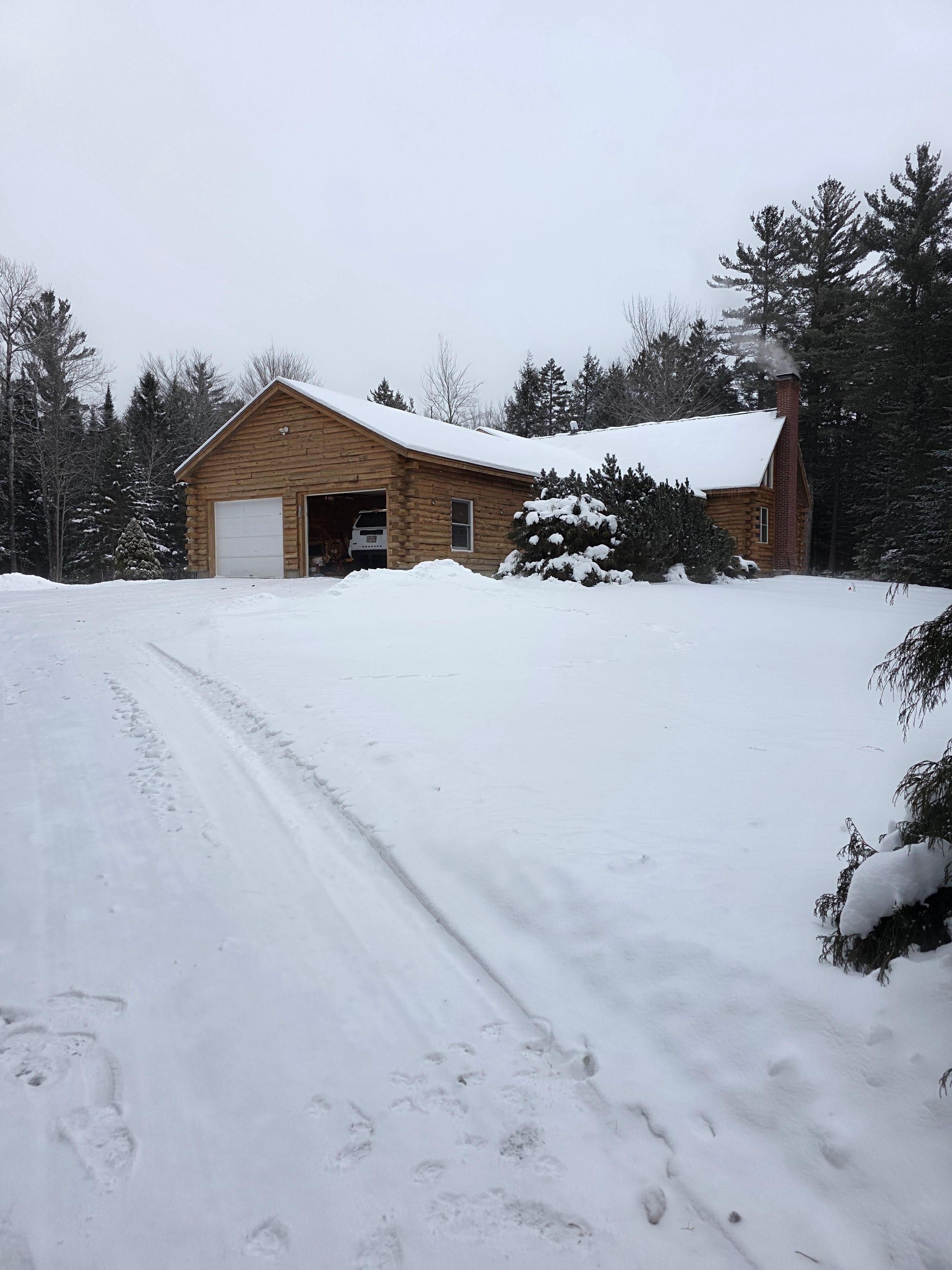 Cozy cabin in the snowy white mountains 