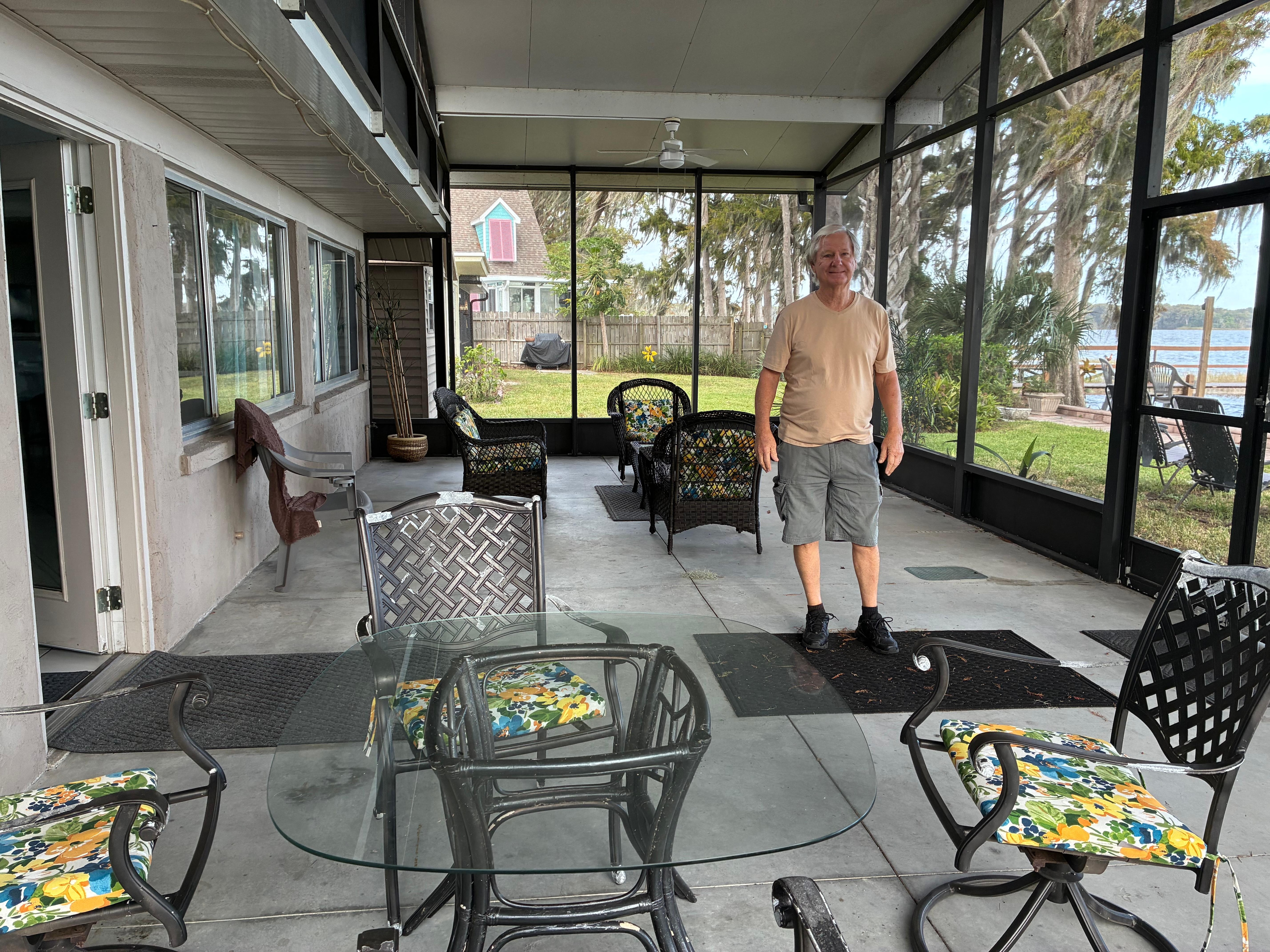 Screen room. Two sitting areas.