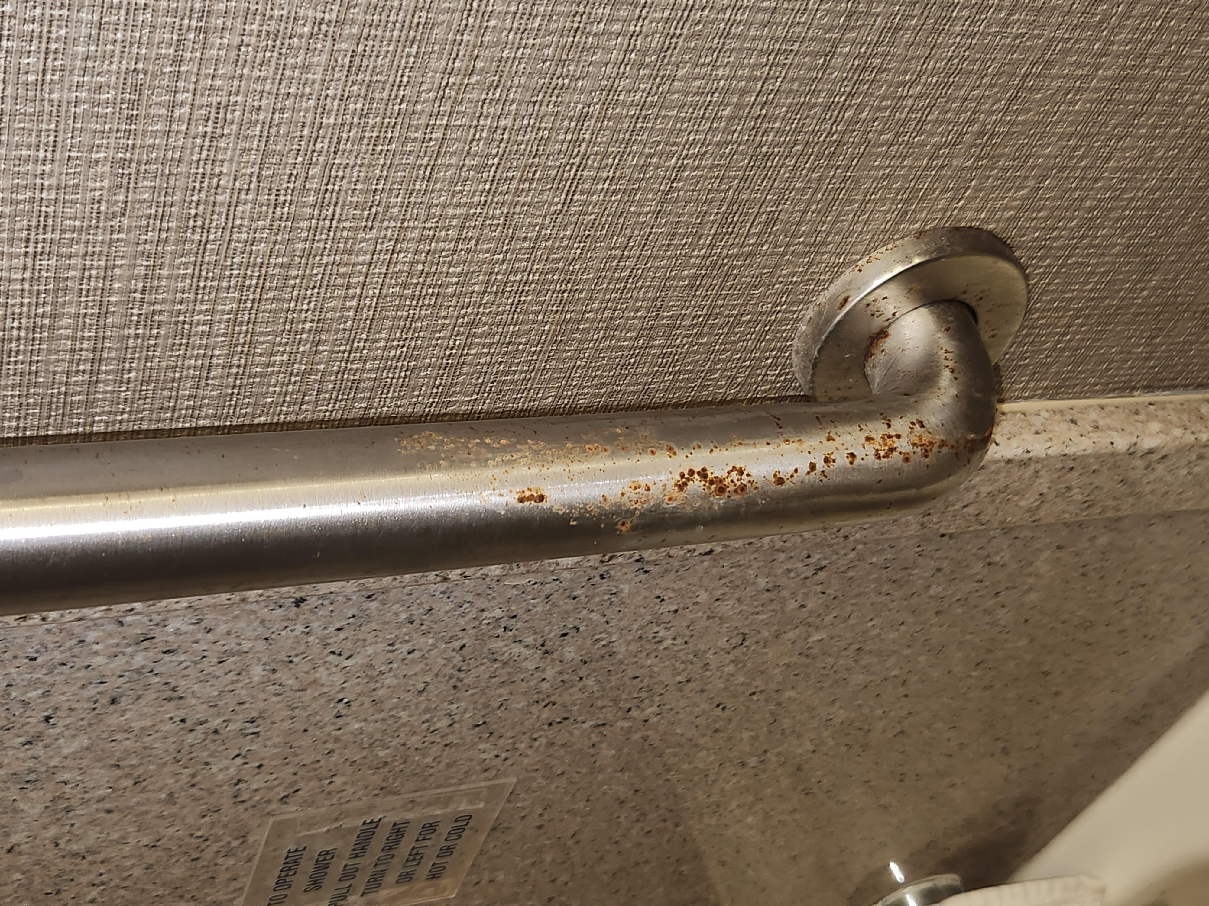 Rust on handrail in Bathroom