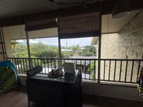 View of the balcony and the view towards the parking lot.