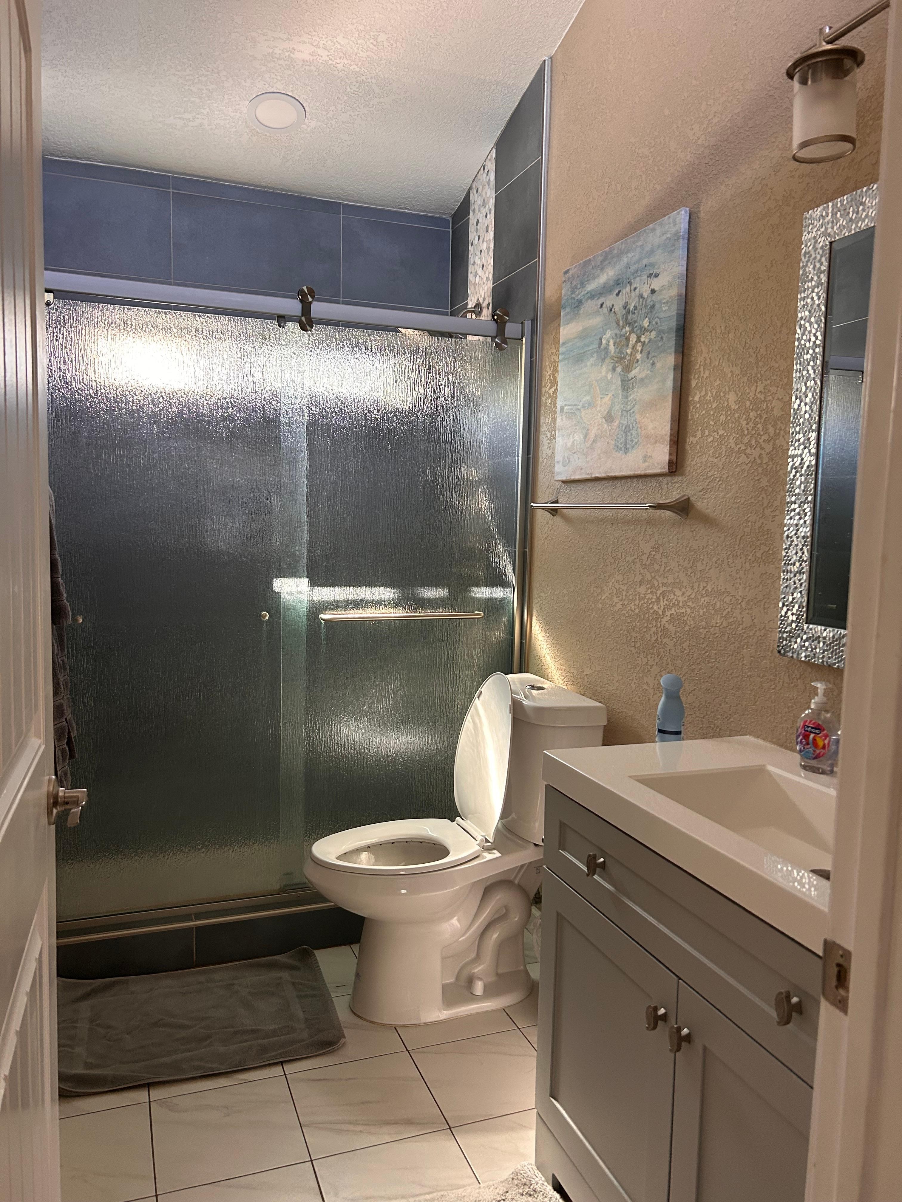 Bathroom beautiful tile shower, great water pressure 