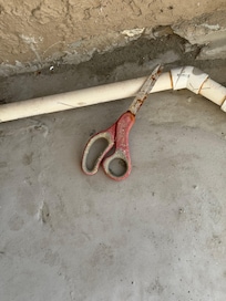 Scissors on the balcony.