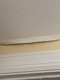 Peeling paint in bathroom ceiling
