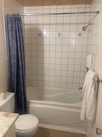 The shower faucet should be upgraded along with the bathroom tiles.