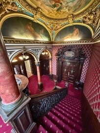 Main staircase and entrance to restaurant