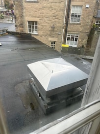 Very noisy extraction fan outside the window