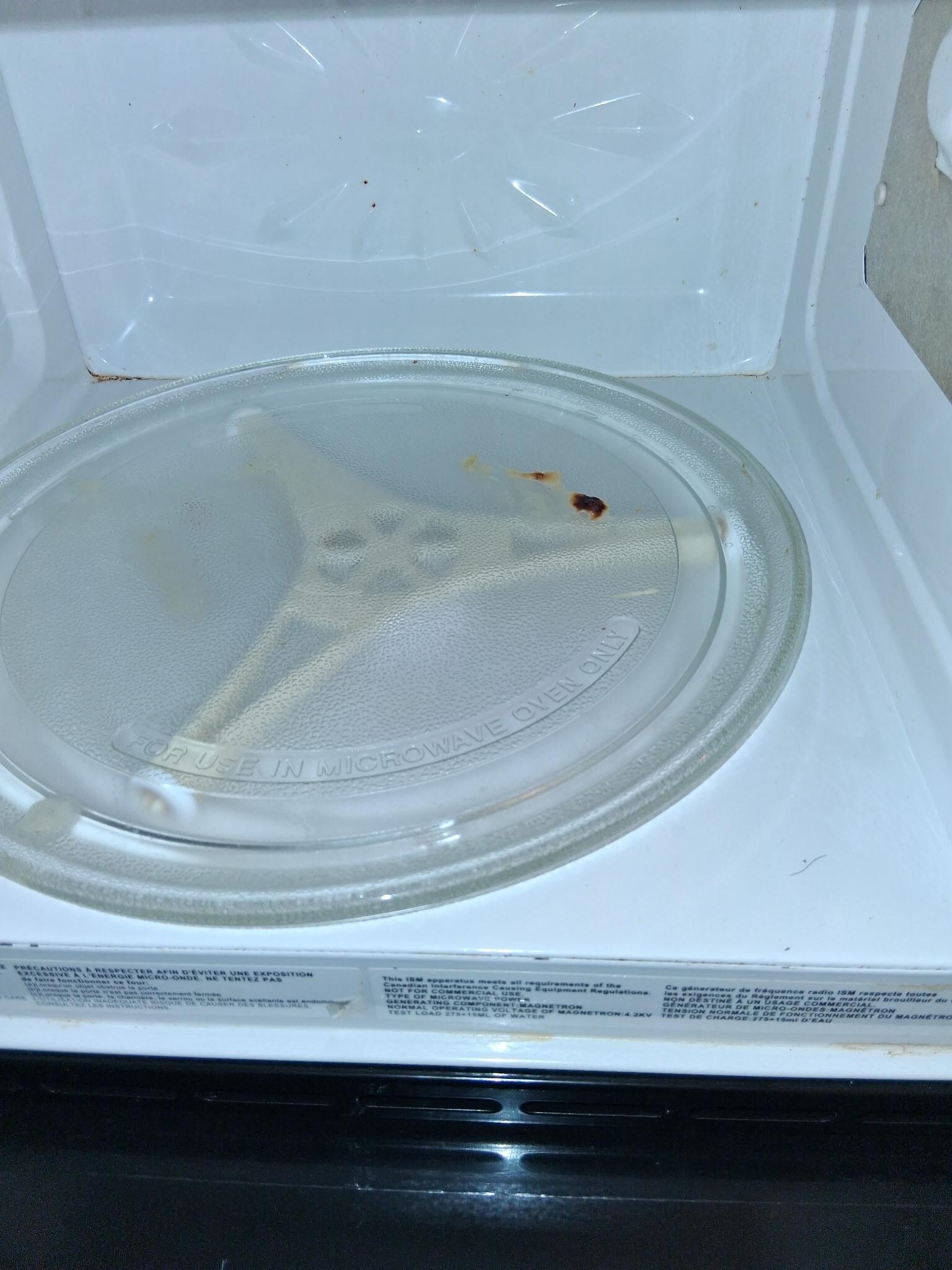Microwave had old food stains.