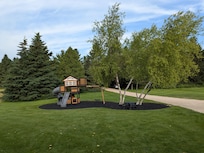 The playset in the front yard