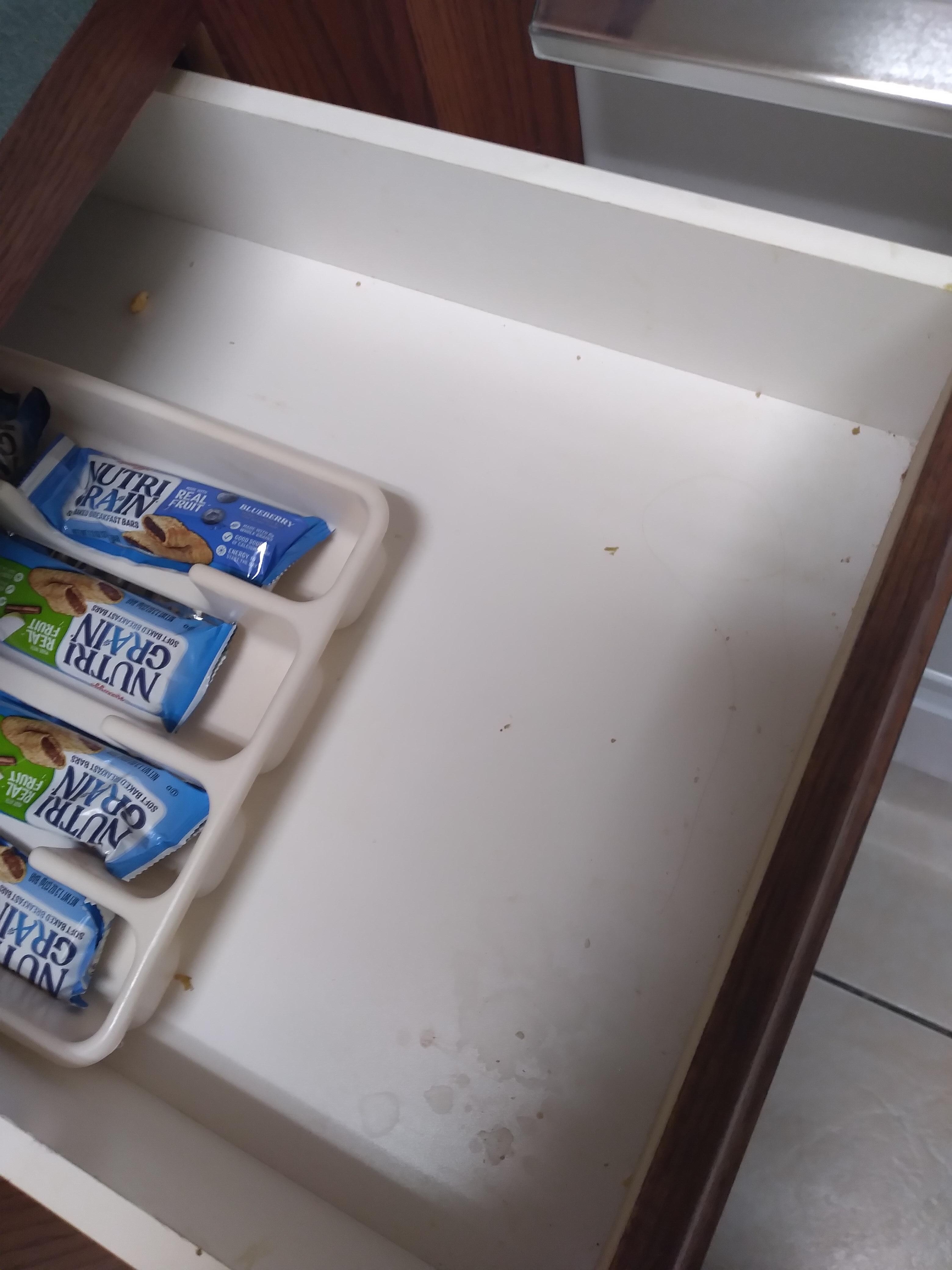 Courtesy snacks with hair & dust in the kitchen drawer(GROSS)...food wrappers and used towel left in the iron closet from previous guest.