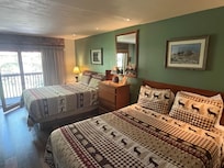 Double queen (unfortunately tge photo doesn’t show the fireplace and complete kitchenette to the left)