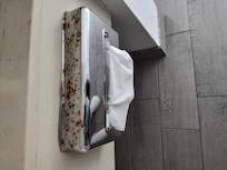 Rust. Who wants to use Kleenex that comes from that rusty dispenser