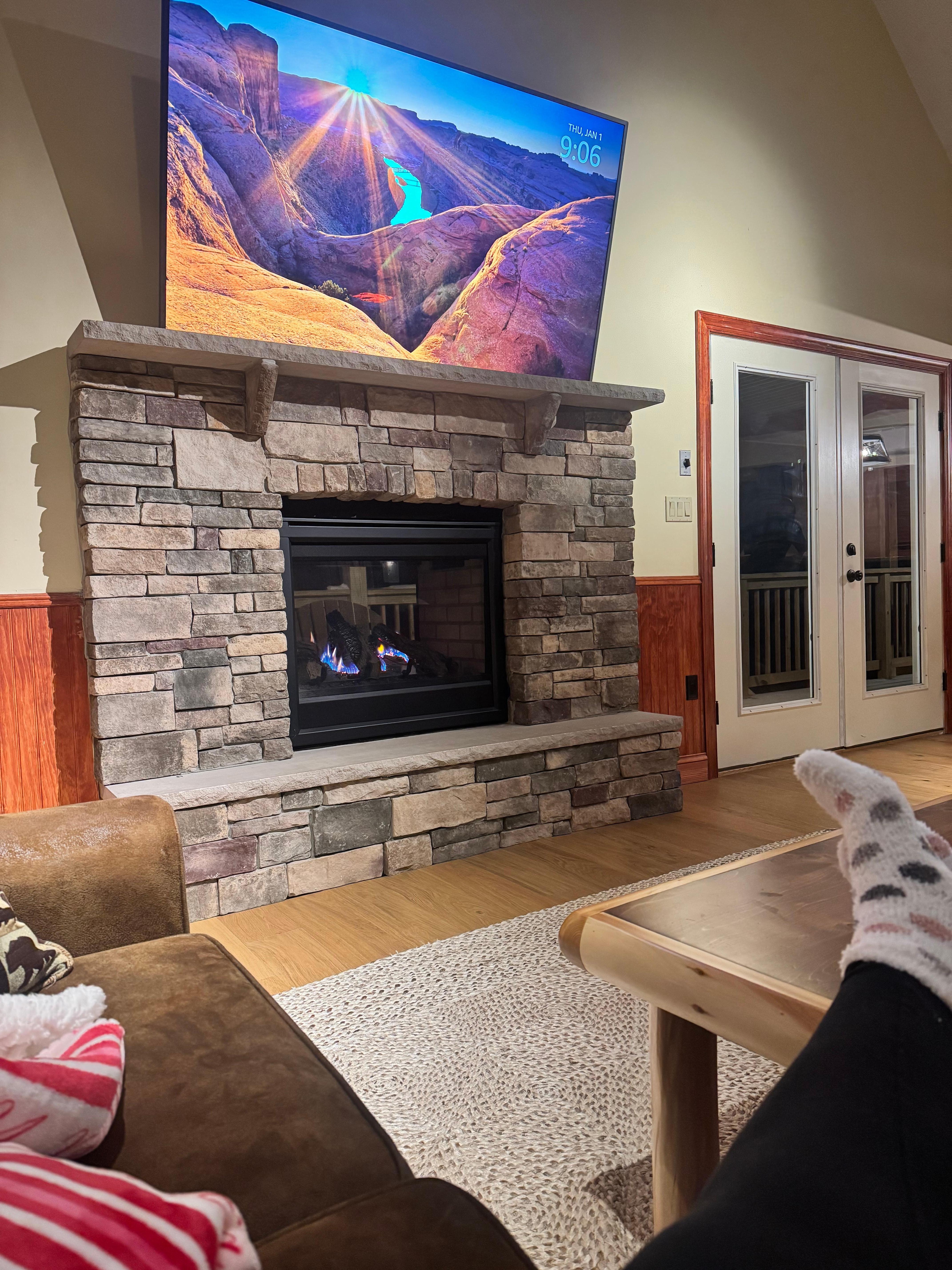 Enjoying a movie and the warm fireplace