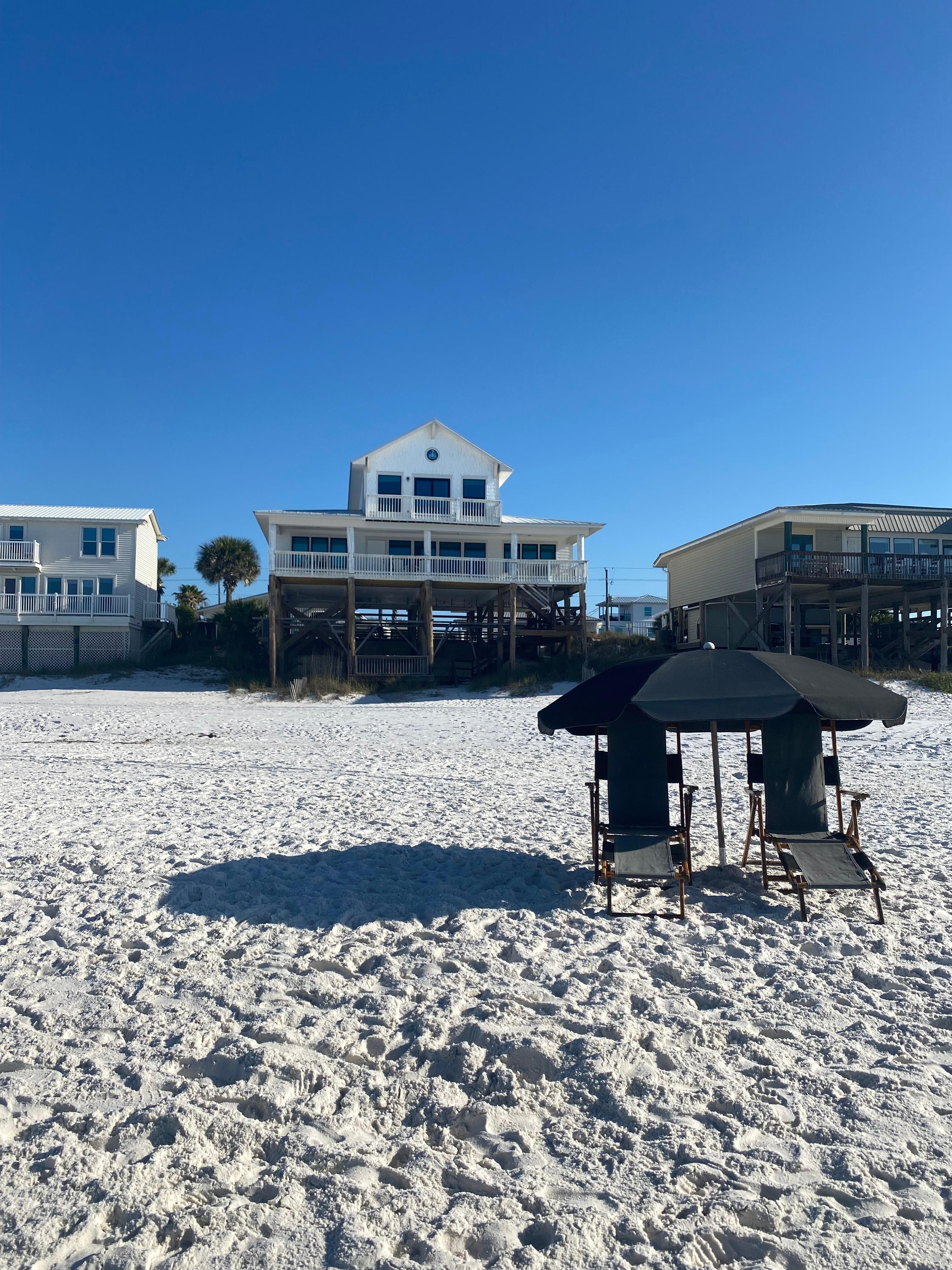 Home view from ocean (umbrella and chairs included in rental)