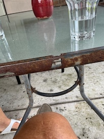 Rusted table with jagged rusty edges