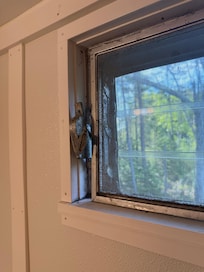 Screws missing from window operating handle so it was difficult to open