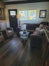 Living room was nicely decorated and spacious for a cabin.