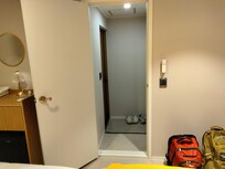 Extra entry way, with bathroom off to the side.