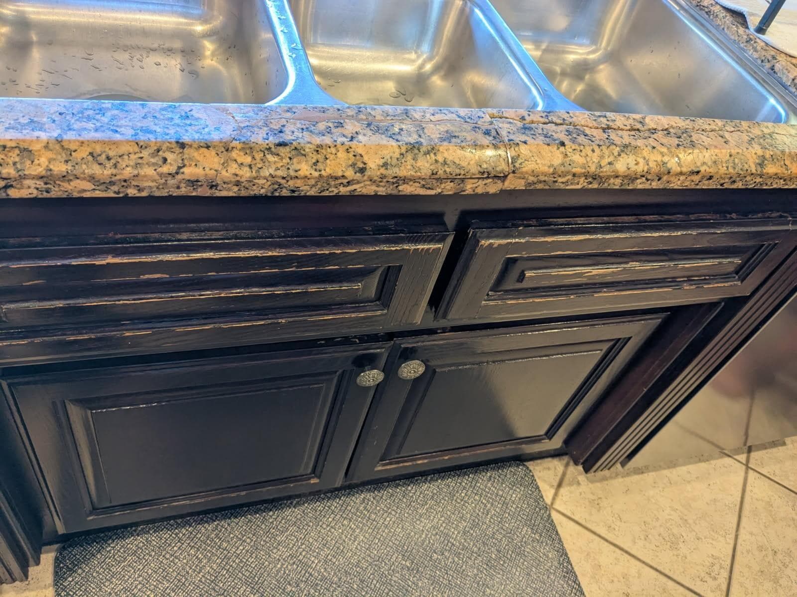 This is one angle of the busted granite. When using the sink, pieces would move around. 