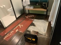 Water seeping from under flooring and resealed with just glue!