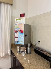 I never saw such a fancy yogurt machine. I especially loved adding in fresh raspberries.