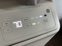 Two buttons on the AC were broken, but still fully functional.