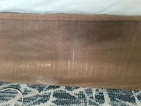 White stains on the bed