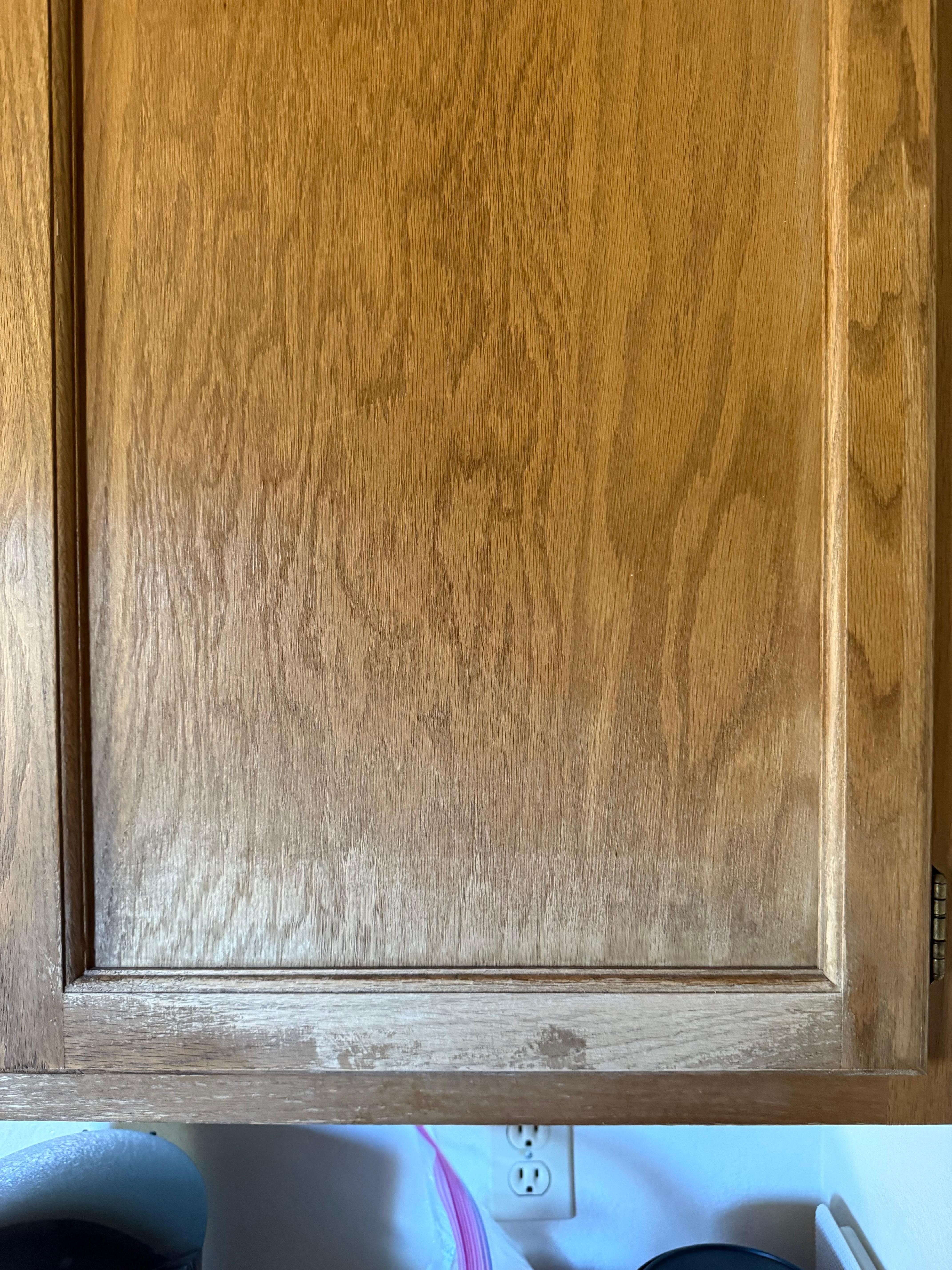 The finish is worn off the kitchen cabinets