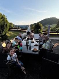 Enjoying dinner outside on the patio.