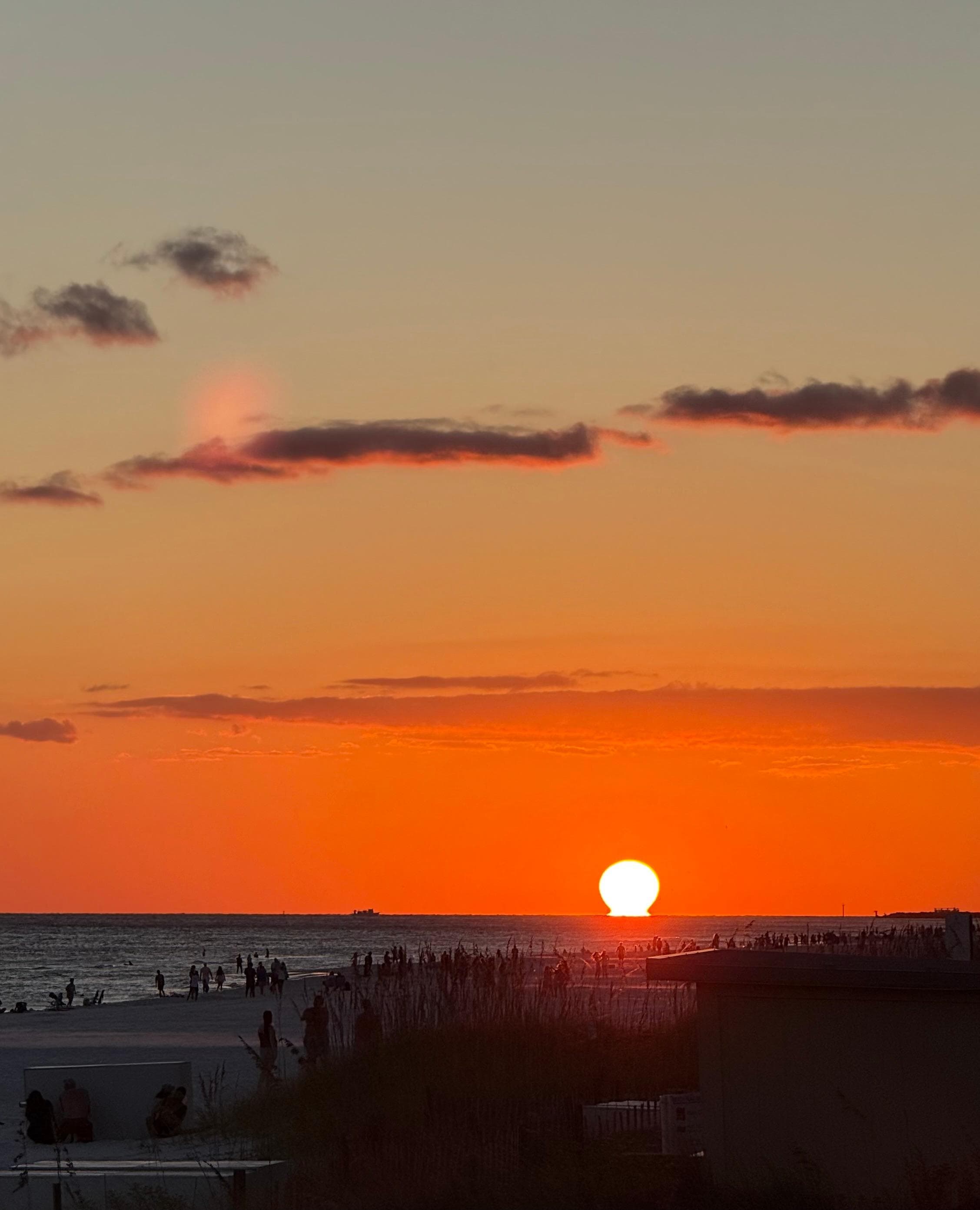 Sunset off the beach walkway. 