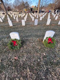 Graves of serviceman and wife from Alabama at Arlington National Cemetery
