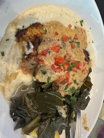 Blackened Redfish with grits and greens (special of the day)