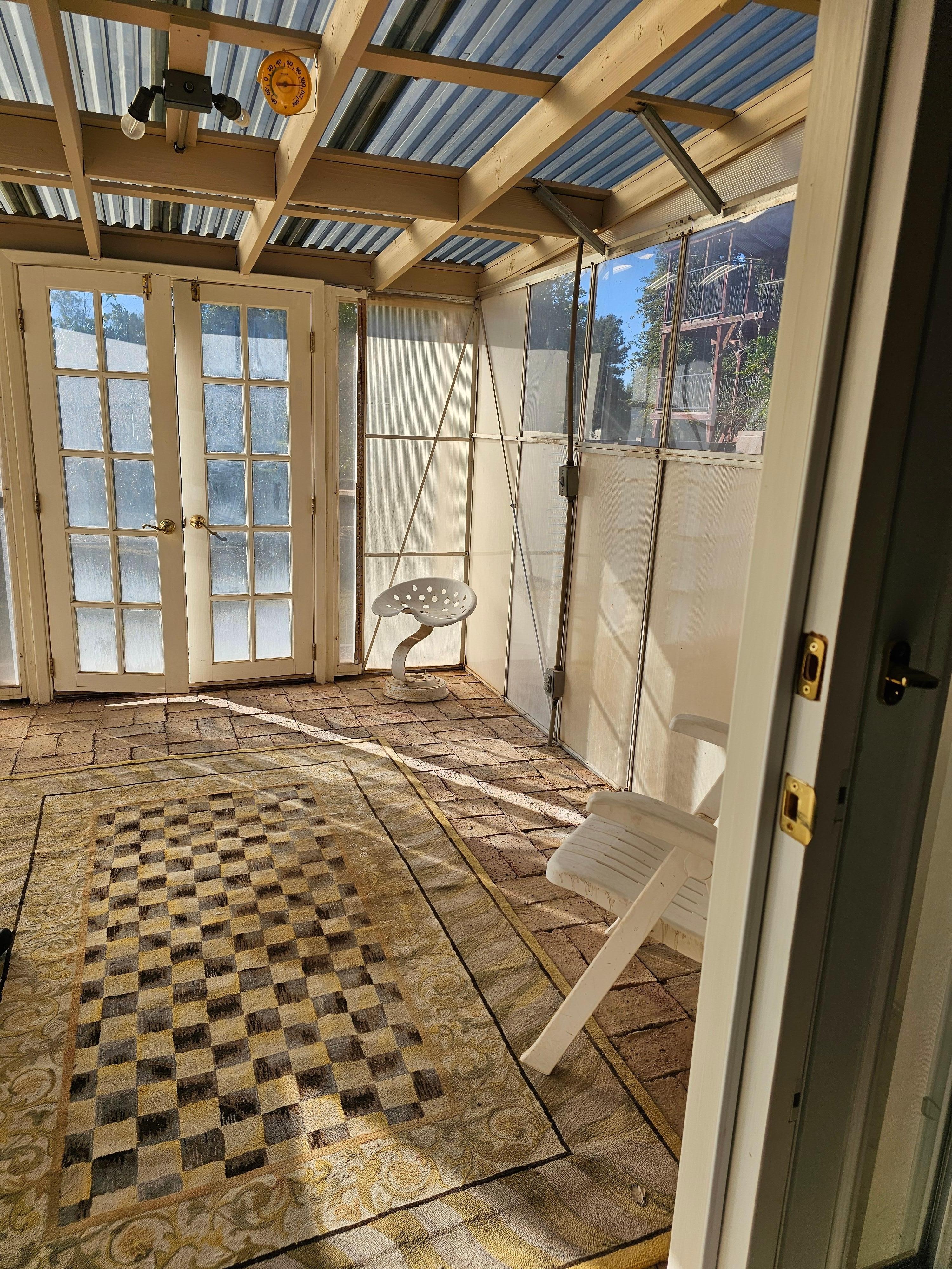 The greenhouse was fantastic for morning meditation. Leaving the door open did warm the house during the day.