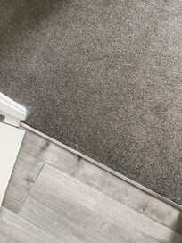 Large toe nail directly Infront of bathroom entrance