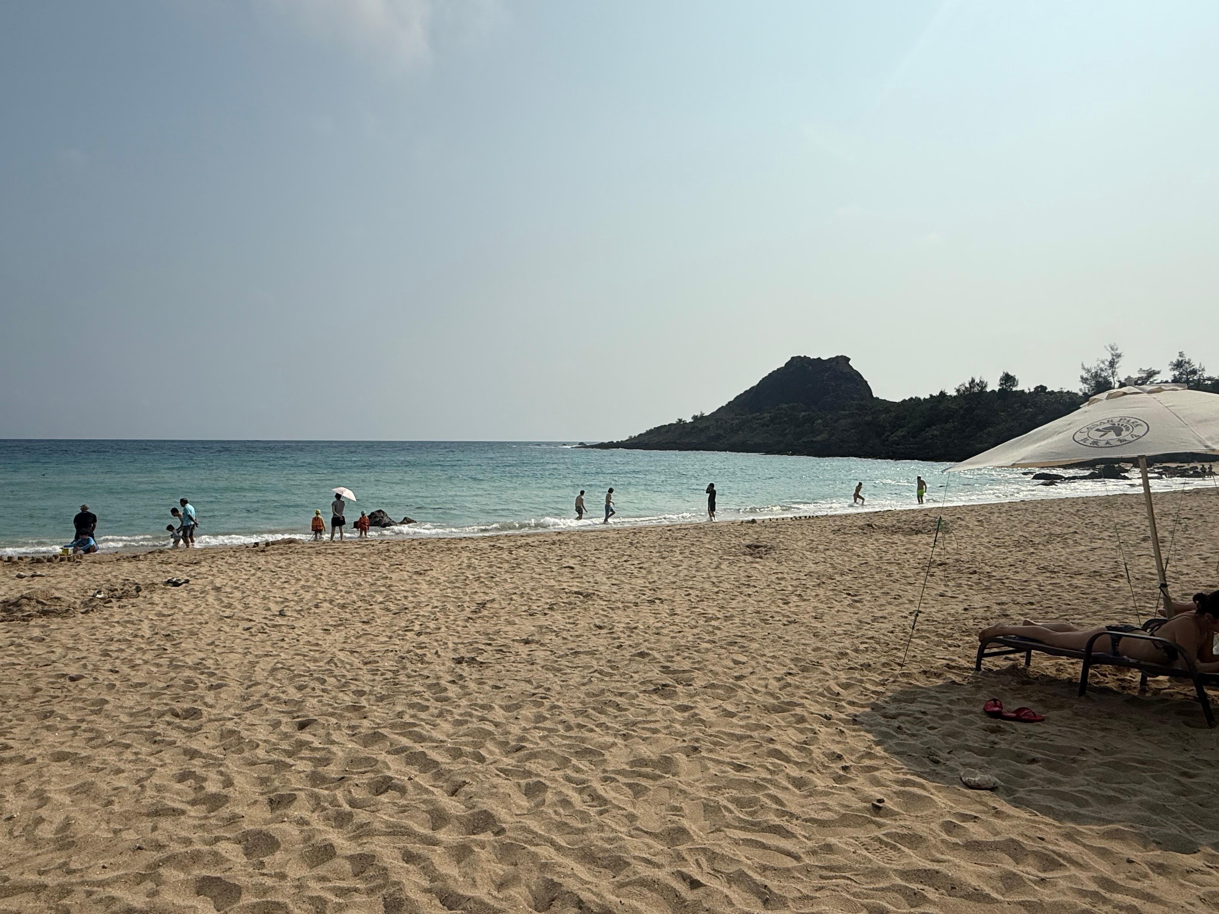 The beach across the street from the hotel, accessible by a path under the road.  