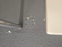A shower rod is a tension stick that is unsafe and can cause an accident if one should stumble and grab onto the shower curtain everything would come down. Spot around it shows many falling of the wall falling