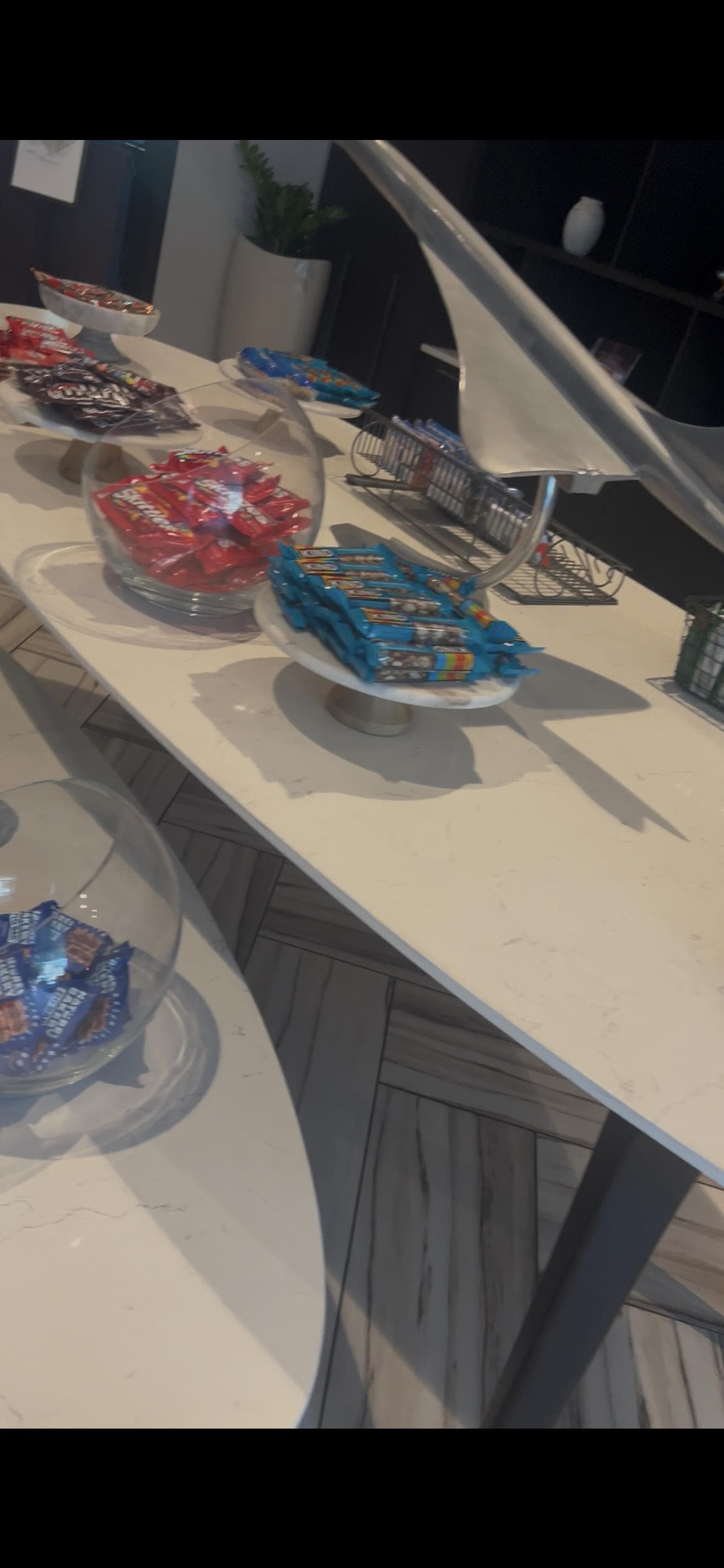 Kitchen bar with lots of drinks and snacks 