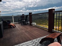 The deck with lots of room and beautiful scenery