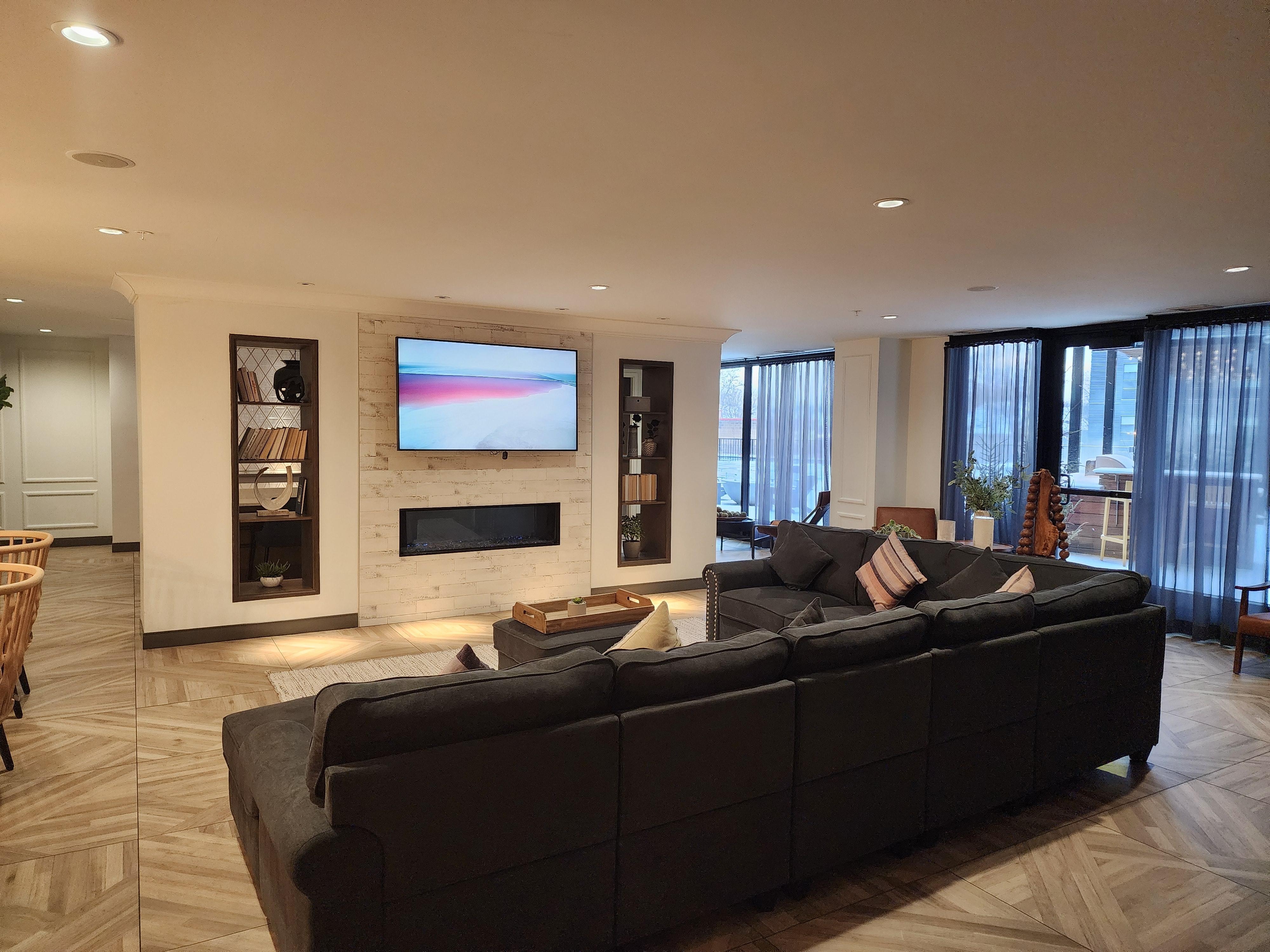 Large lounge area and game room on the same floor as the apartment and pool 