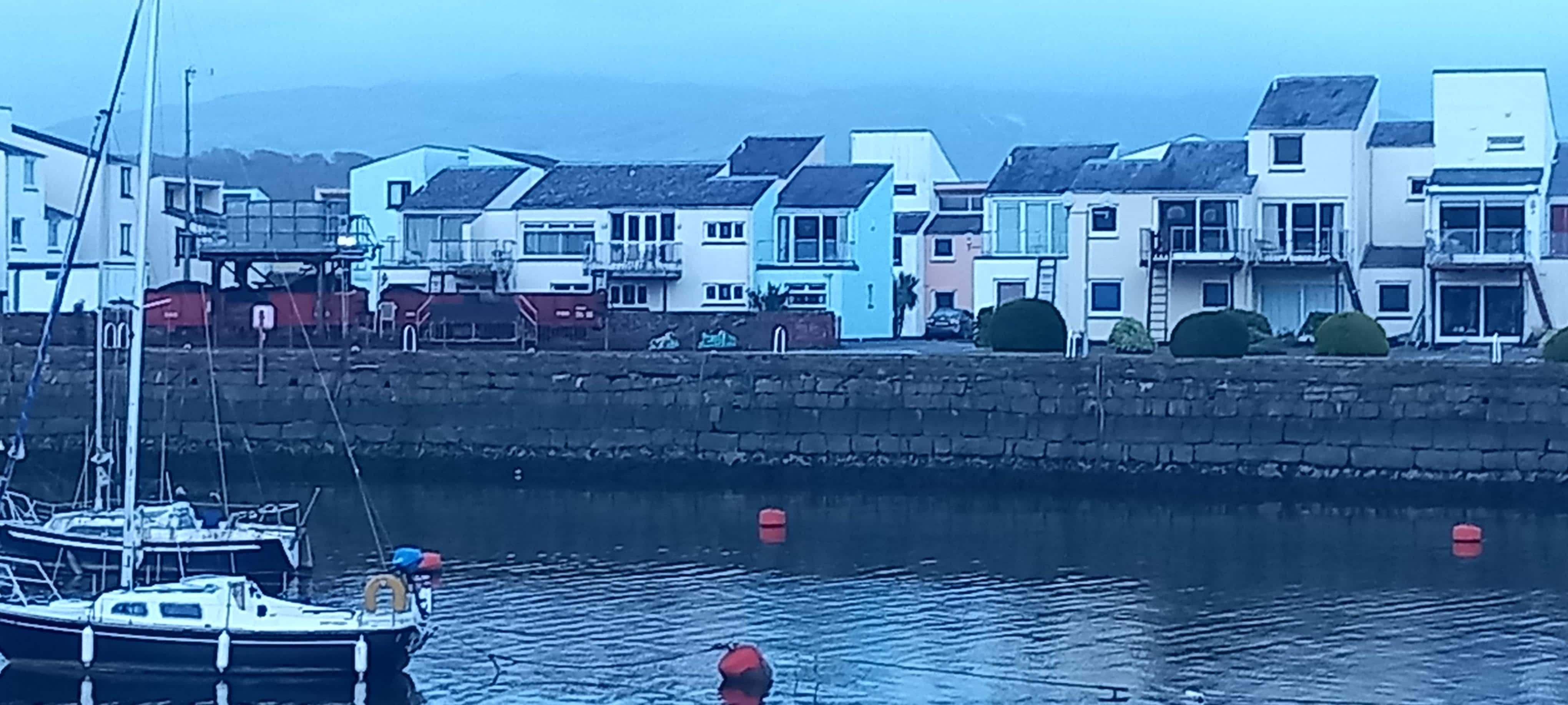 View of the apartment from across the harbour. It's the blue one in the centre.
