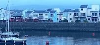 View of the apartment from across the harbour. It's the blue one in the centre.