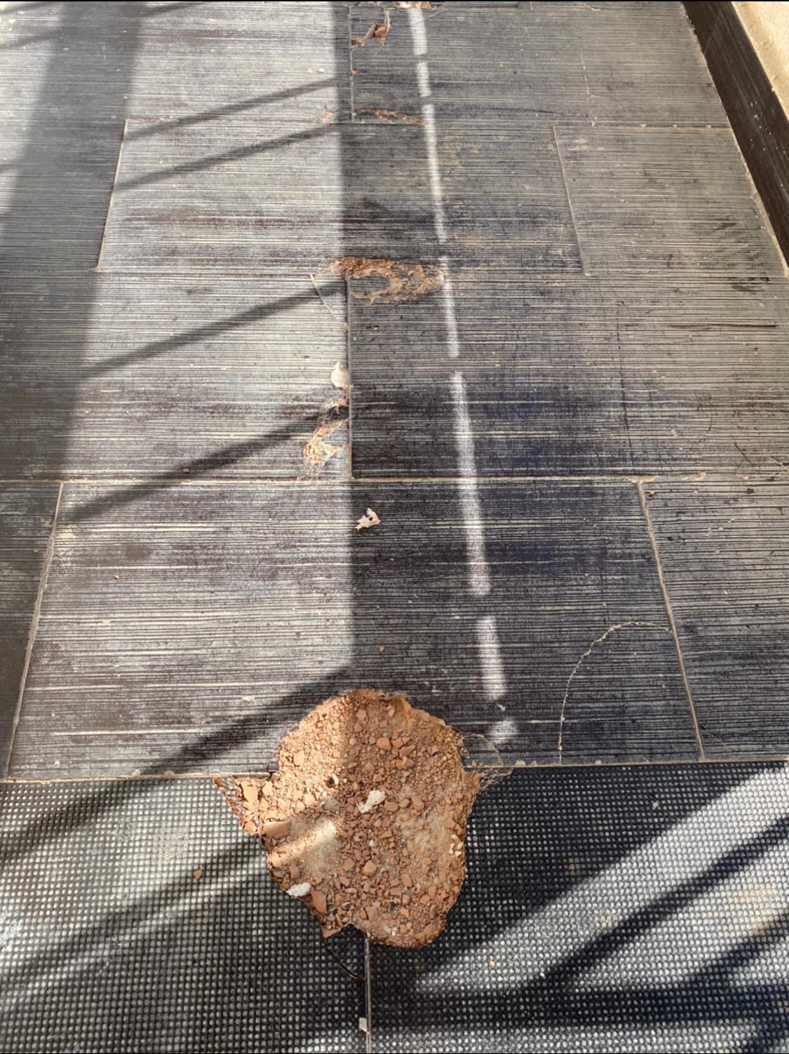 The outside broken floor corridor