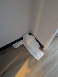 Towels on floor from occupant