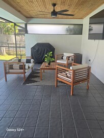 Screened-in lanai and pool area