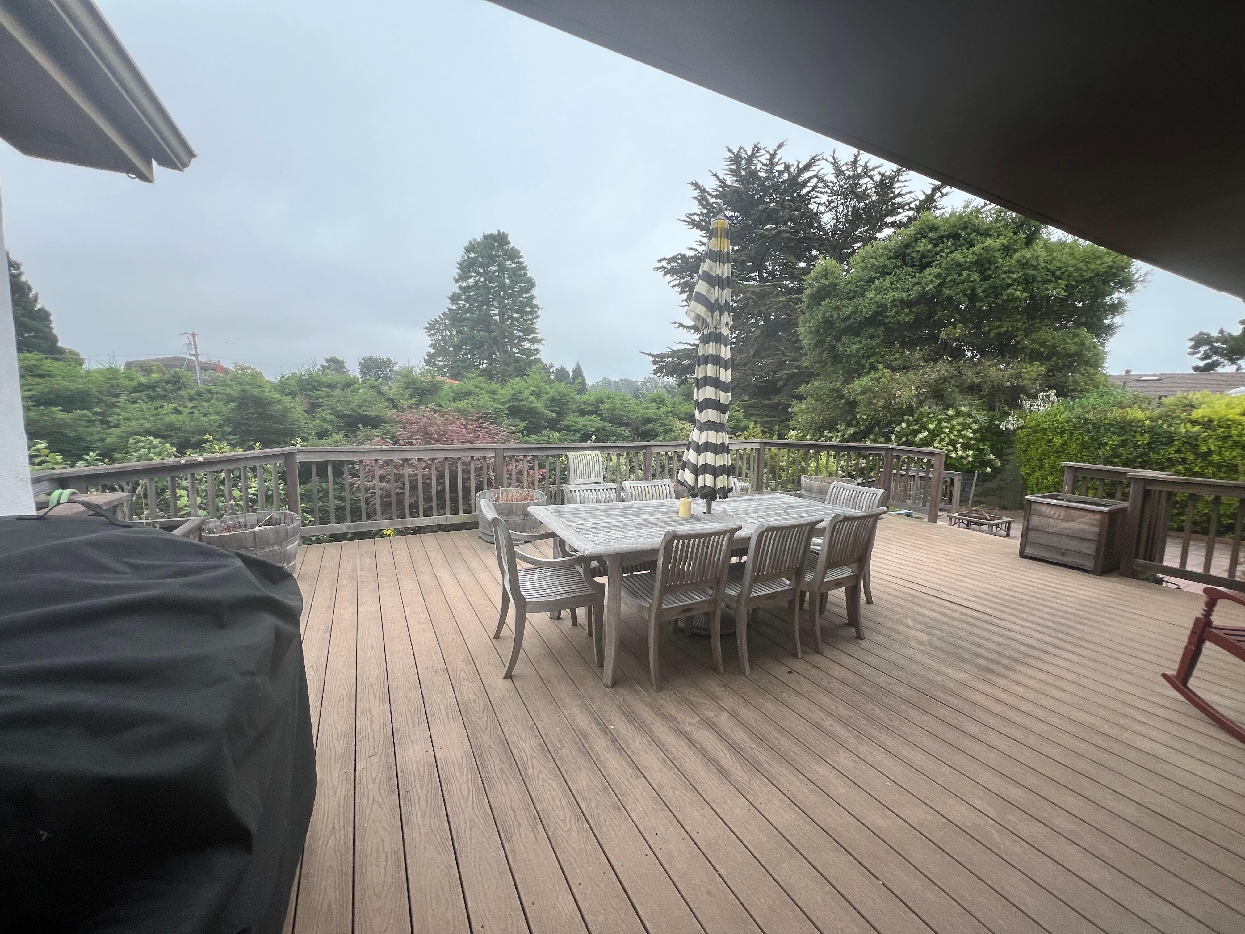 Beautiful deck and yard.
