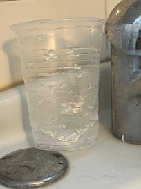 Bended plastic cup for bathroom