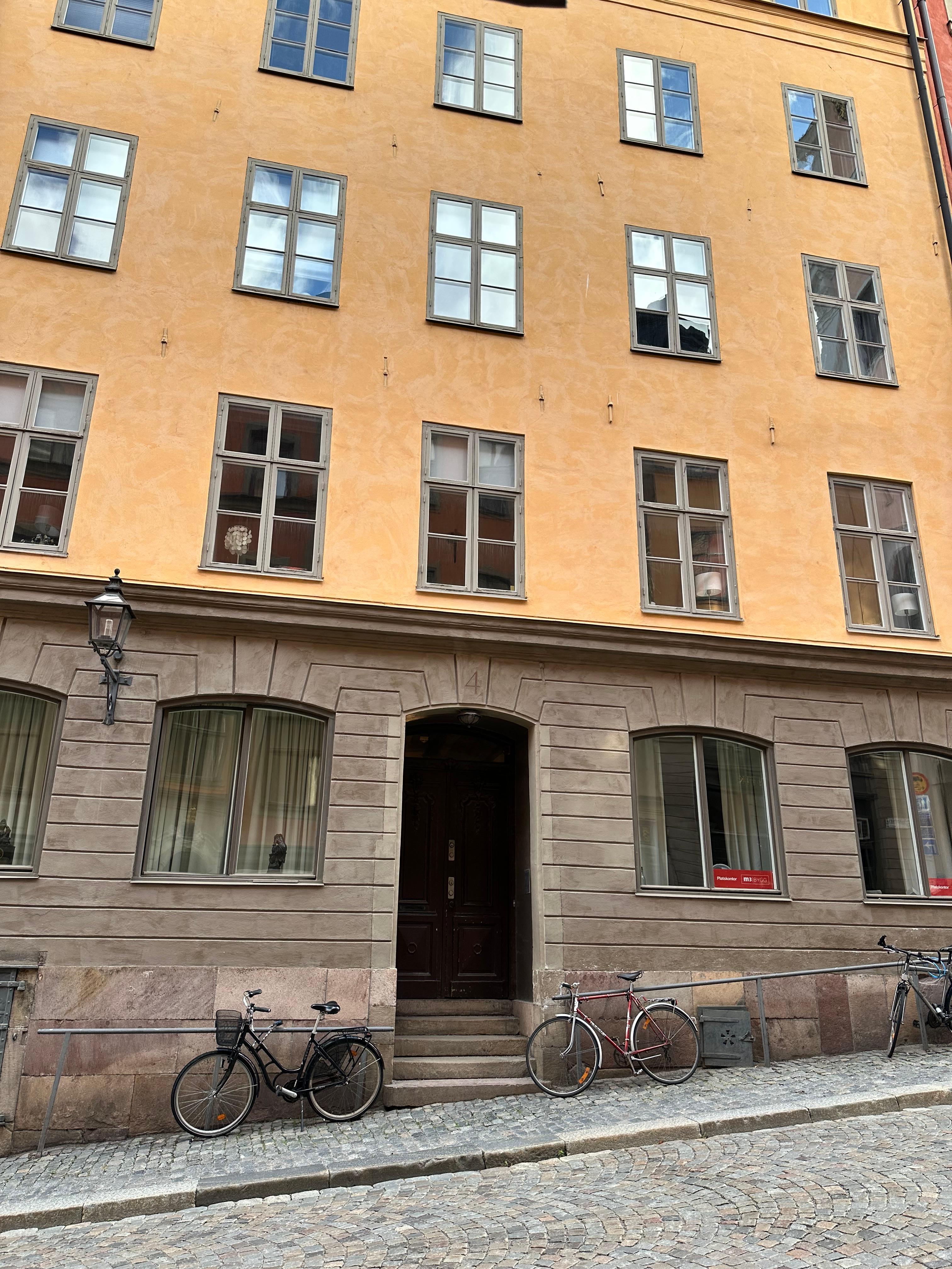 Apartment entrance across the street from hotel lobby 